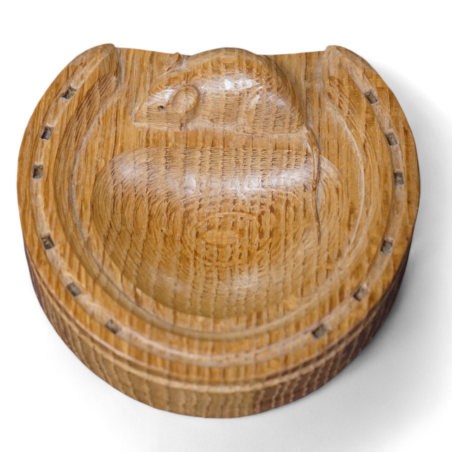 Workshop of Robert 'Mouseman' Thompson, an oak ‘horseshoe’ pin tray, 12.5cm. Condition - good